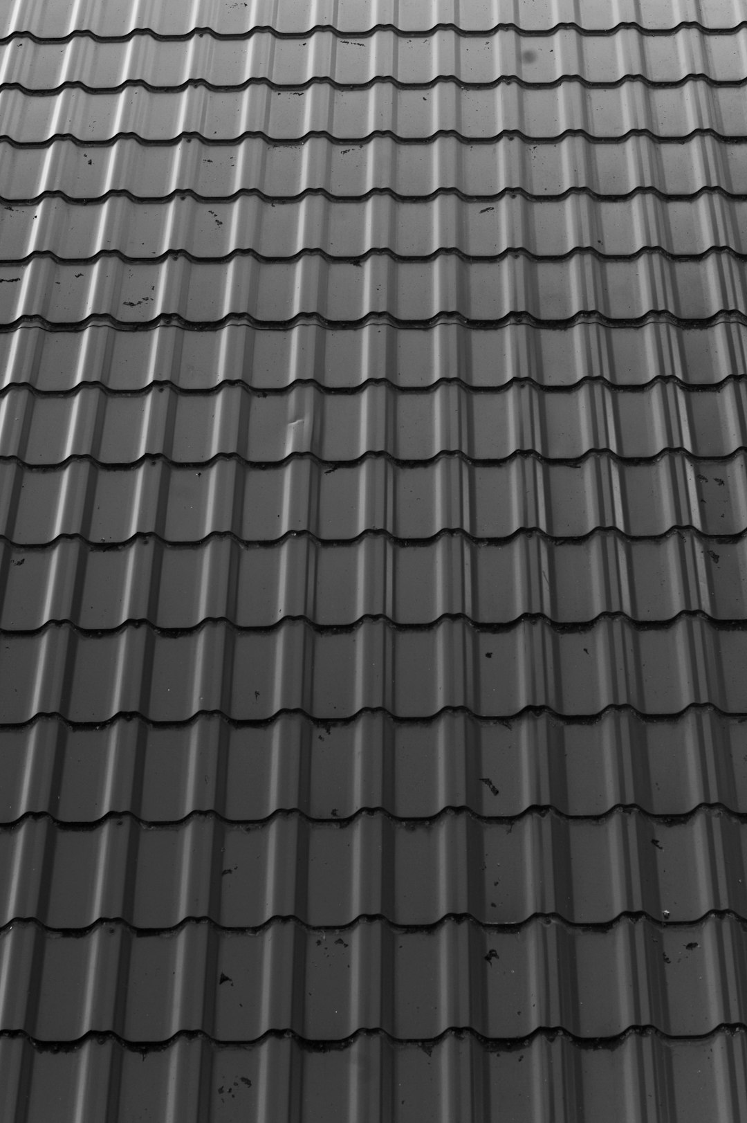 why-choose-us Old metal gray roof in nature.